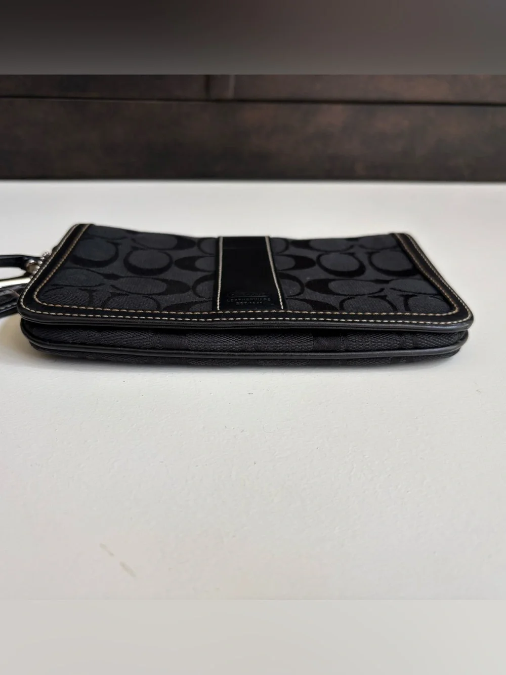 Coach signature jacquard wristlet